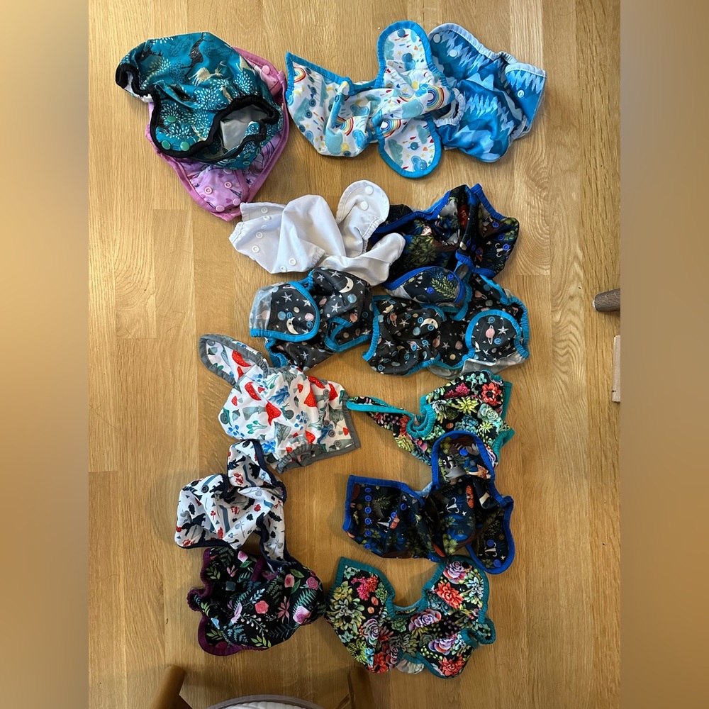 16 diaper covers in size one